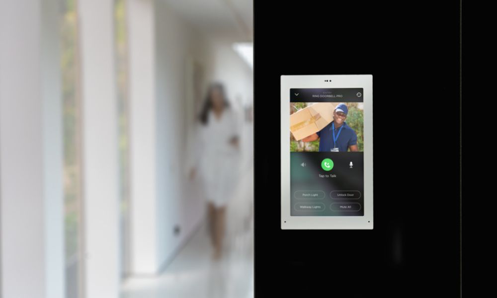 <span class="uk-h4">Savant wall-mounted touchscreen shows surveillance footage from a patio&rsquo;s video doorbell.</span>